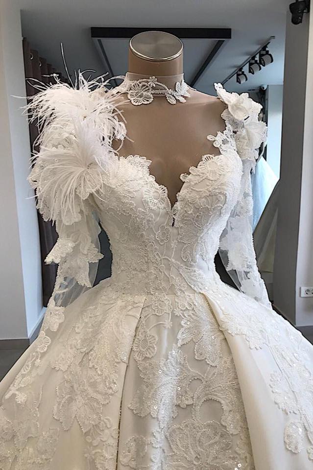 Hier können Sie Modern Brautkleid Mit Ärmel online bei babyonlinedress.de. Prinzessin Hochzeitskleid Mit Federn für Sie mit günstige preis zur Hochzeit.