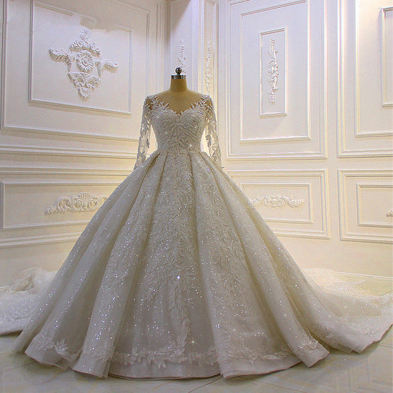 Finden Sie Luxus Brautkleider mit Ärmel online bei babyonlinedress.de. Hochzeitskleider Prinzessin Glitzer für Sie zur Hochzeit gehen.