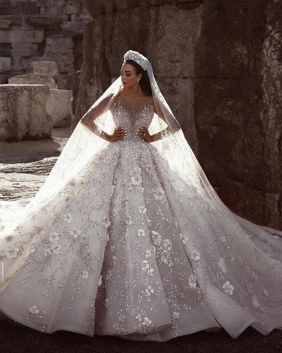Hier können Sie Luxus Brautkleider Mit Ärmel online bei babyonlinedress.de. A Linie Spitze Hochzeitskleider Kristal für Sie zur Hochzeit.