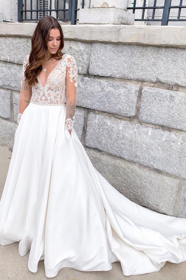 Finden Sie Elegante Hochzeitskleider mit Ärmel online bei babyonlinedress.de. Brautkleider A Linie Spitze für Sie zur Hochzeit gehen.