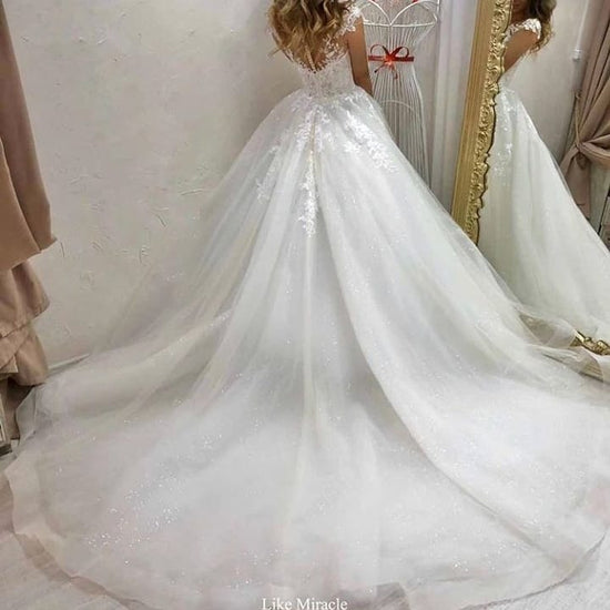 Finden Sie Designer Hochzeitskleider A Linie online bei babyonlinedress.de. Brautkleid Tüll für Sie nach maß online kaufen.