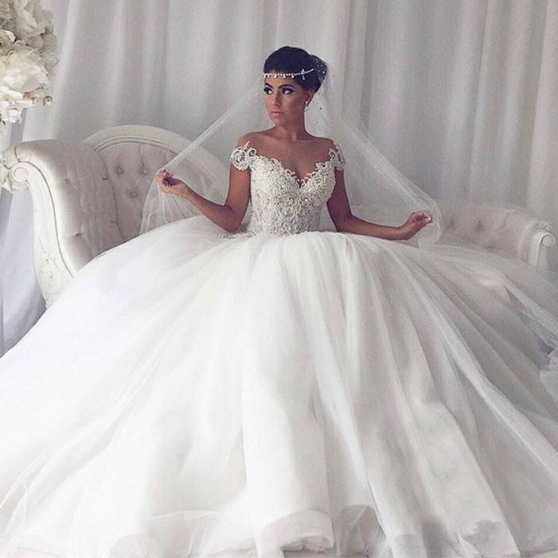 hier können Sie Elegant Weiße Hochzeitskleider Mit Spitze online bei babyonlinedress.de kaufen. Prinzessin Tüll Brautkleider für Sie zur Hochzeit.