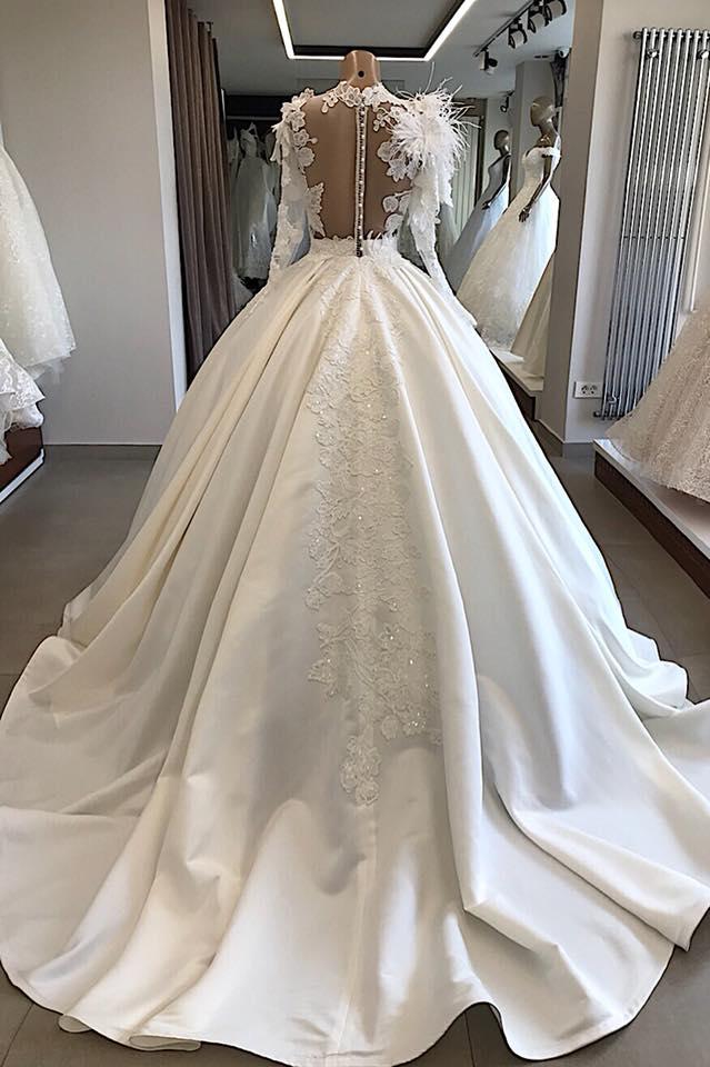 Hier können Sie Modern Brautkleid Mit Ärmel online bei babyonlinedress.de. Prinzessin Hochzeitskleid Mit Federn für Sie mit günstige preis zur Hochzeit.